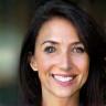 Headshot photo of Ana Santos, a corporate manager.
